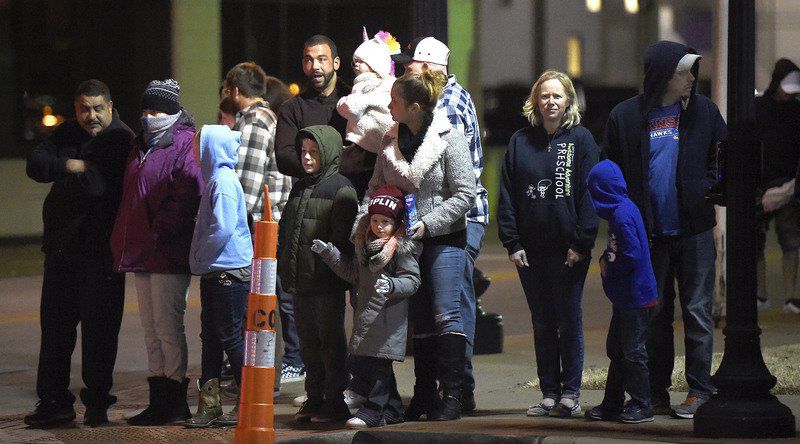 Spectators applaud theme, tradition of Christmas parade